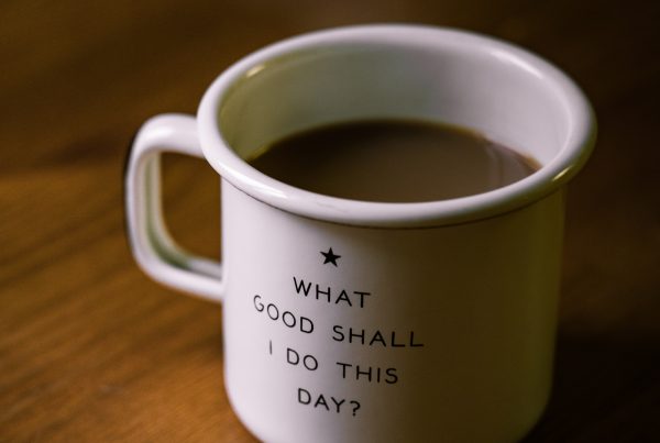 mug with writing on saying "what good shall I do this day?"